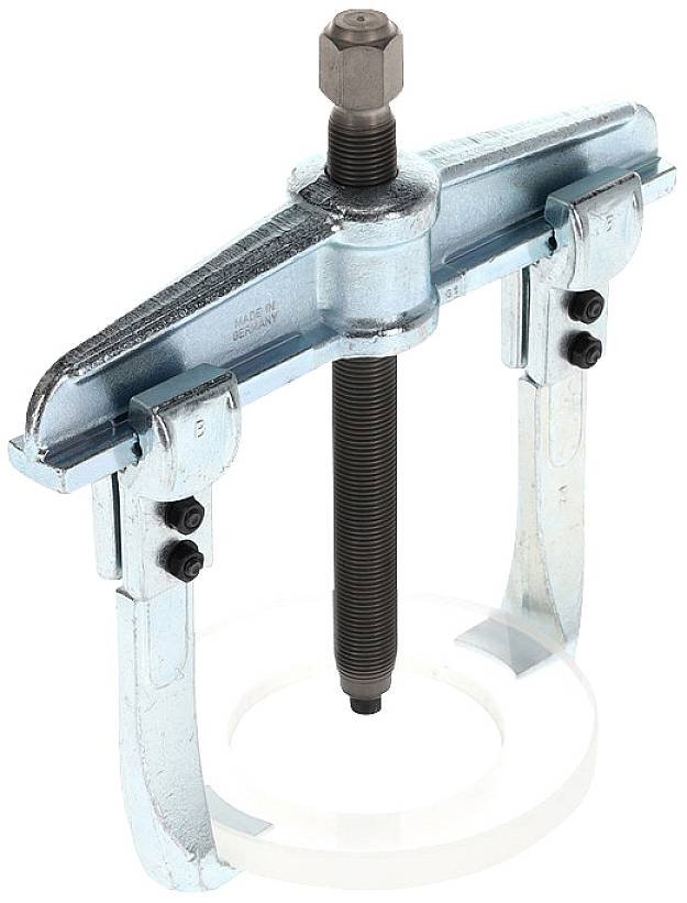 Illustrated is a two-legged metal puller with two hooked arms and a central screw, designed for removing bearings or pulleys.