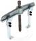 Two-arm extraction device, suitable for removing bearings or gears. The screw is used for tightening and loosening.