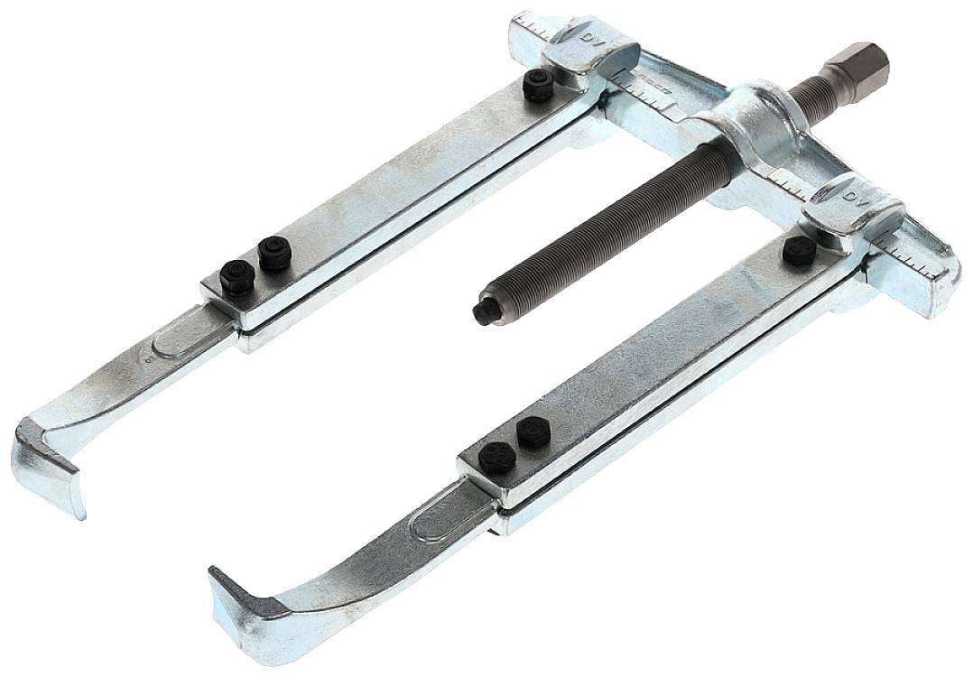 Two-legged metal puller used for removing bearings or gears from shafts in mechanical applications.