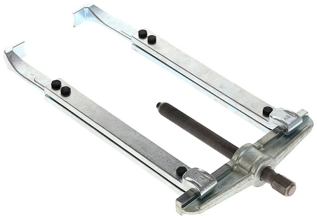 Metal two-arm puller with adjustable arms and central spindle, used for removing bearings or gears from a shaft.