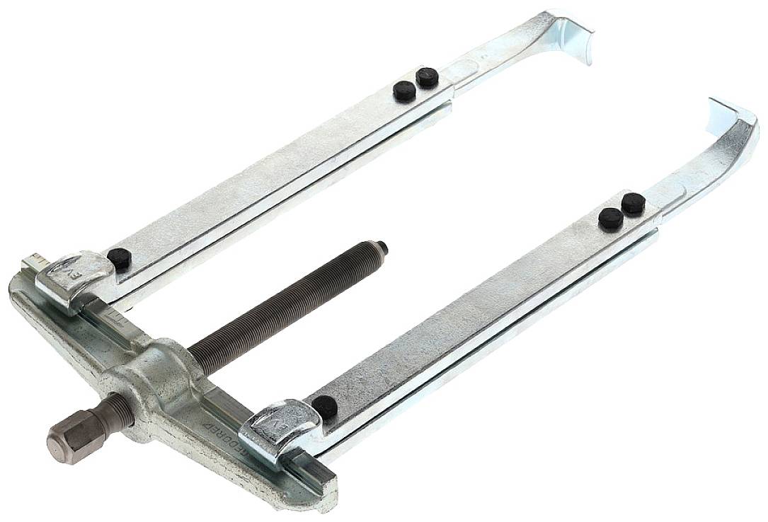 Metal puller with two arms and a central tensioning mechanism for uniform pressure distribution when removing bearings.