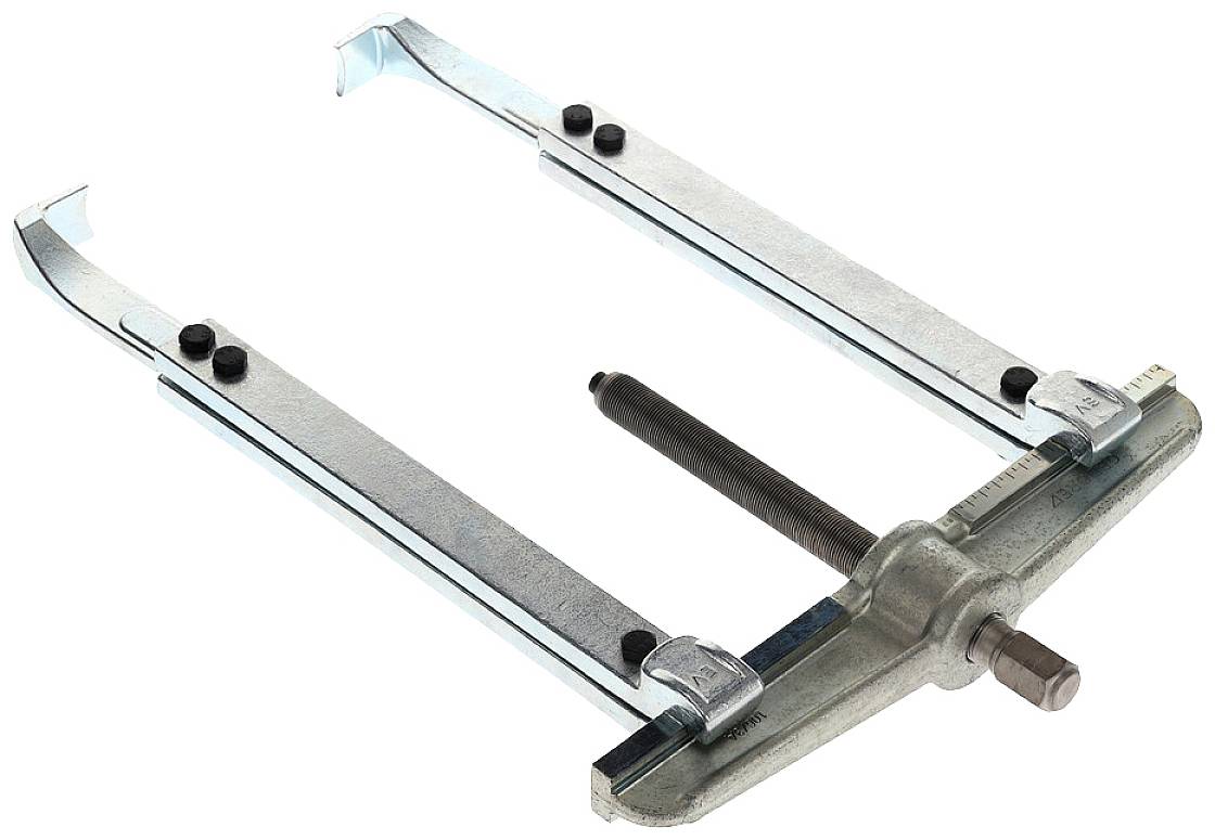 Shock absorber removal tool with metal frame and screw mechanism for safely removing shock absorbers.