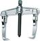 Silver puller with two hooks and a central screw for secure removal of gears or bearings. Manufacturer: GEDORE.
