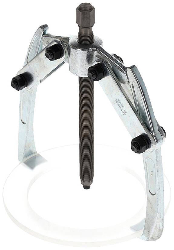 A three-armed metallic puller with a central screw, used for removing ball bearings or similar components.