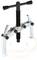 A two-armed puller with a rotary handle, used to remove a component from a shaft.