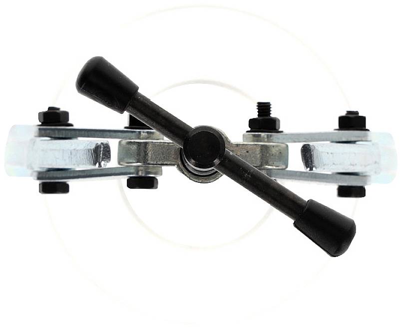 A metallic wheel puller with two arms and a central screw, viewed from above. Used for removing wheels or bearings.