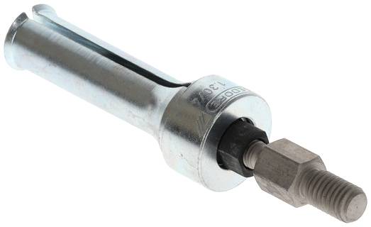 A silver metal wall plug used for securing parts to walls lies on a white background.