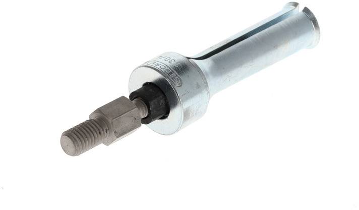 Metal tool with a cylindrical head and recessed screw, used for holding or connecting components in machinery.