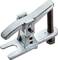 Two-armed metal puller with screw, primarily used for removing bearings and similar components.