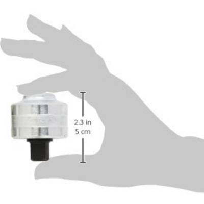 A hand is holding a round, metallic tool that is 5 cm high. It shows the size compared to the hand.