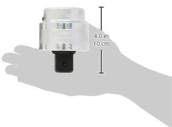 A hand is holding a bushing with a diameter of 4 cm. The shadow of the bushing indicates dimensions of 4.0 inches or 10 cm in height.