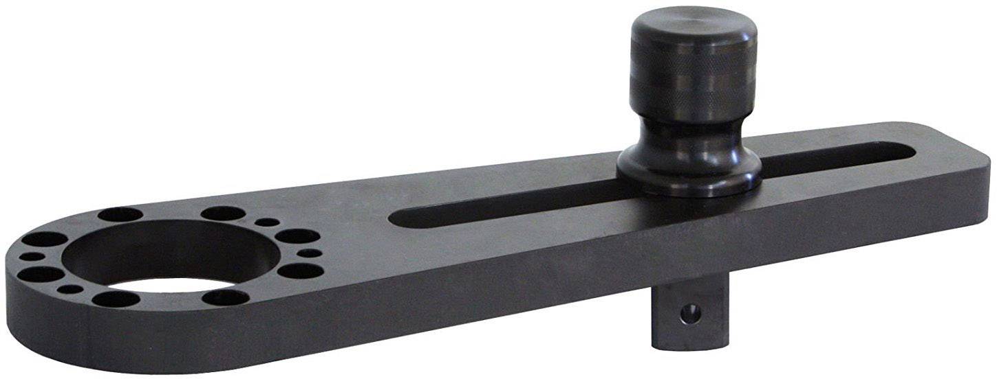 A flat metal lever with multiple holes and a cylindrical handle on top. Likely a tool part or adapter.