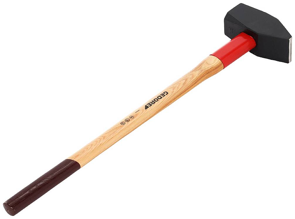 A sledgehammer with a wooden handle, black head and red accenting lies at an angle on a white surface.