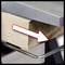 A wooden block with a diagonal cut edge supports a metal plate, which is pointed to with a white arrow from left to right.