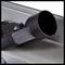 A black pipe is attached to a metallic device. Screws and nuts are visible. Front view of a technical component.