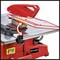 Einhell Table Circular Saw with red casing. Saw blade on a pivoting mount, suitable for precise woodworking.