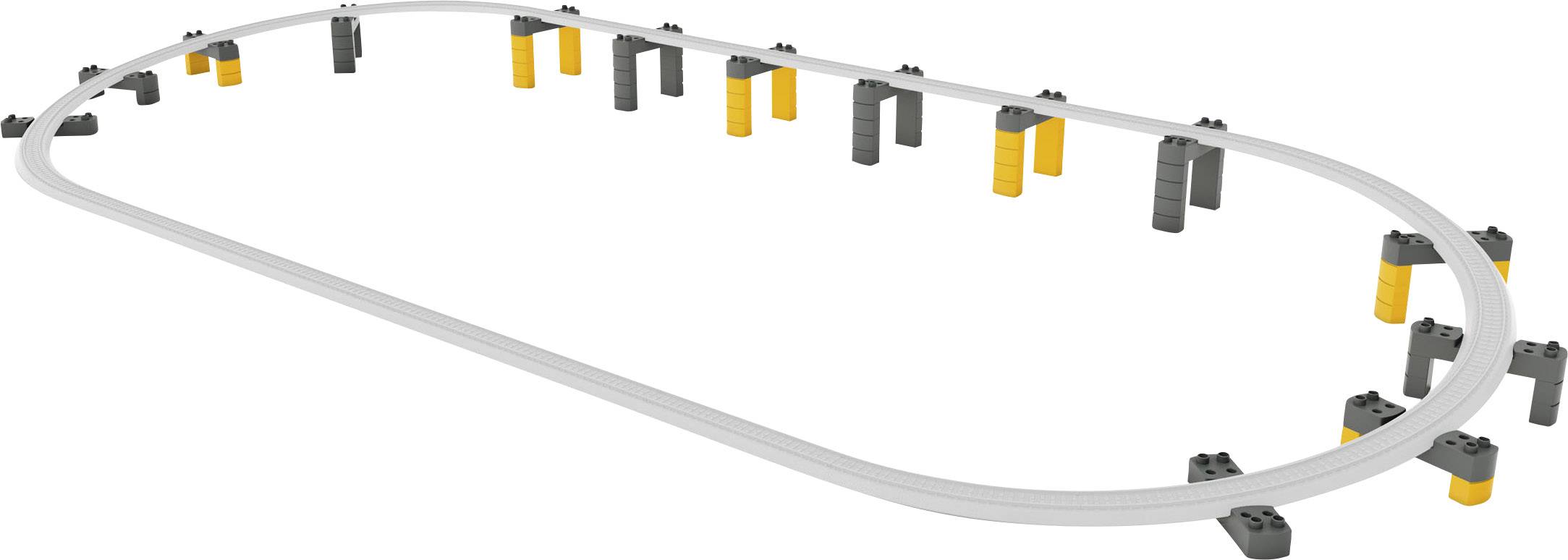 A grey model railway track on raised yellow and grey supports, forming an oval shape.
