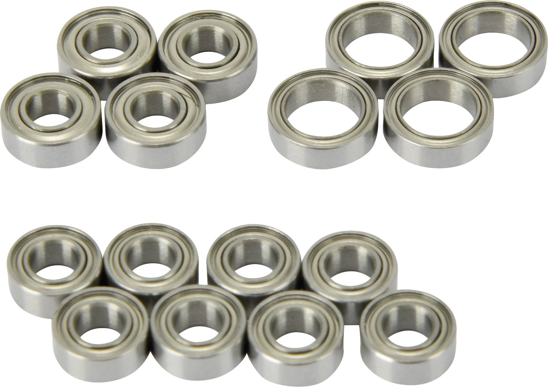 'Twelve metal ball bearings in various sizes. Two smaller groups of five bearings at the top, and a group of seven bearings at the bottom.'