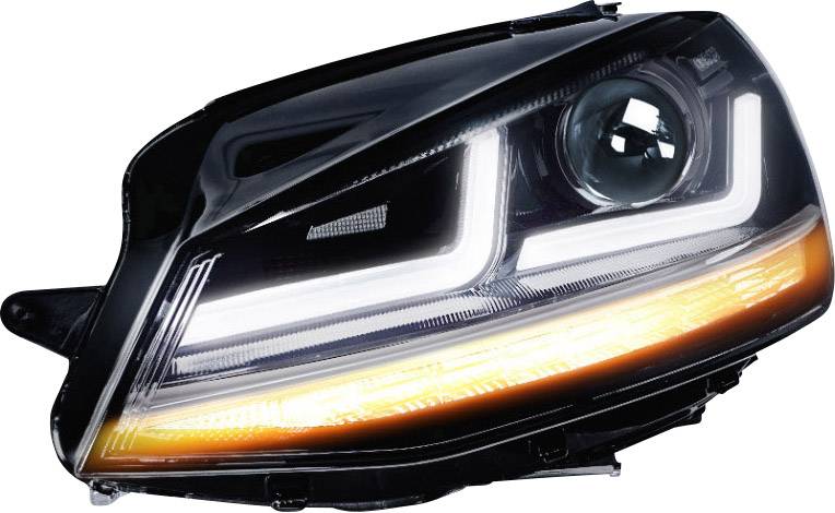 Close-up of a modern car headlight with LED technology, showing white and orange lights.