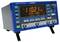 A blue electronic measuring device with a digital display shows '110.21 Hz'. Buttons and connections on the front panel. Model: GX 310.