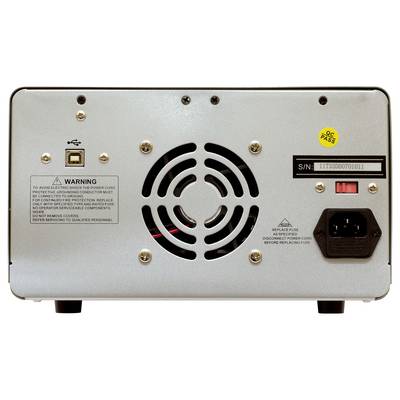 The rear of an electrical device with a fan in the centre, USB and power connection on the right, warning label in the top left.