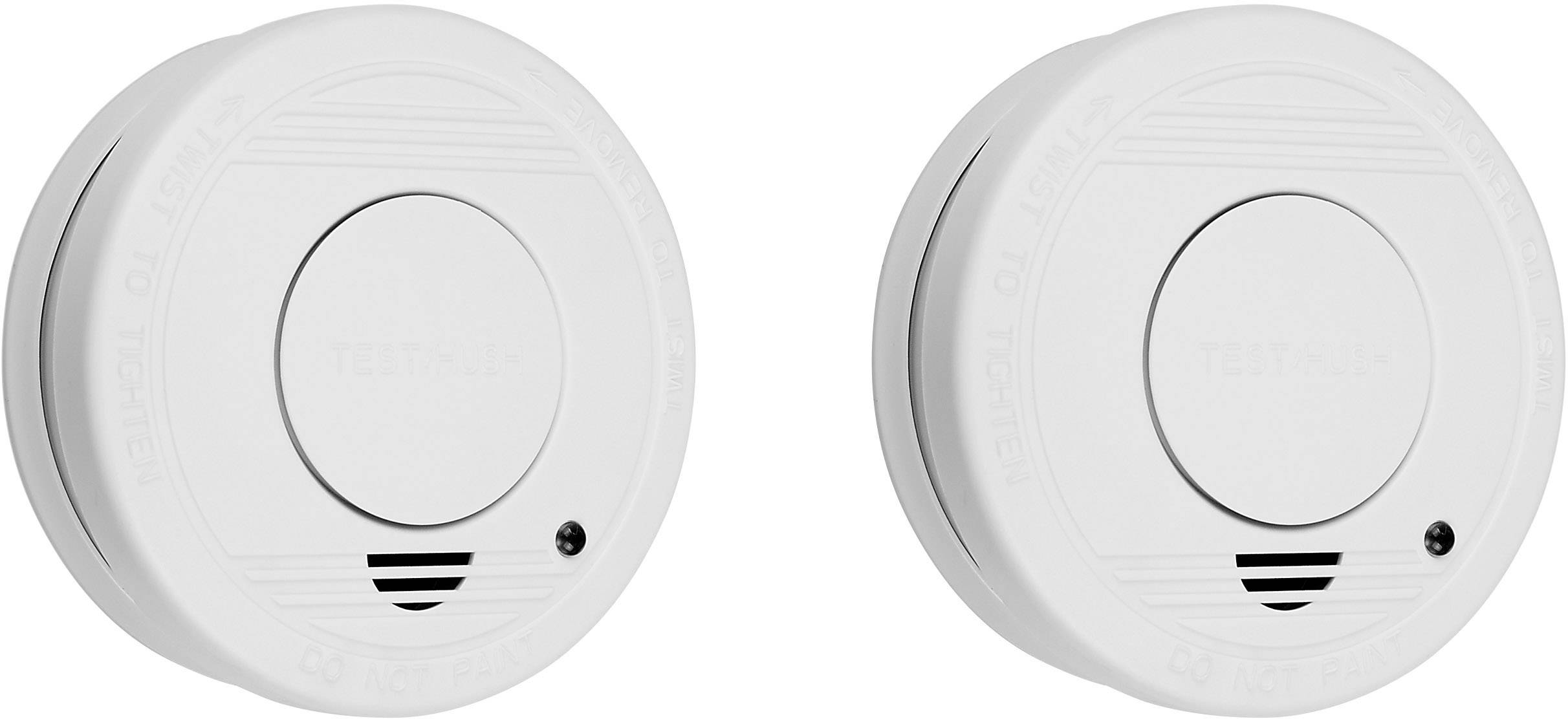 Two white smoke alarms in a close-up view. Both have a test button and ventilation slots at the bottom. They are identical and ready for use.
