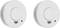 Two white smoke alarms in a close-up view. Both have a test button and ventilation slots at the bottom. They are identical and ready for use.