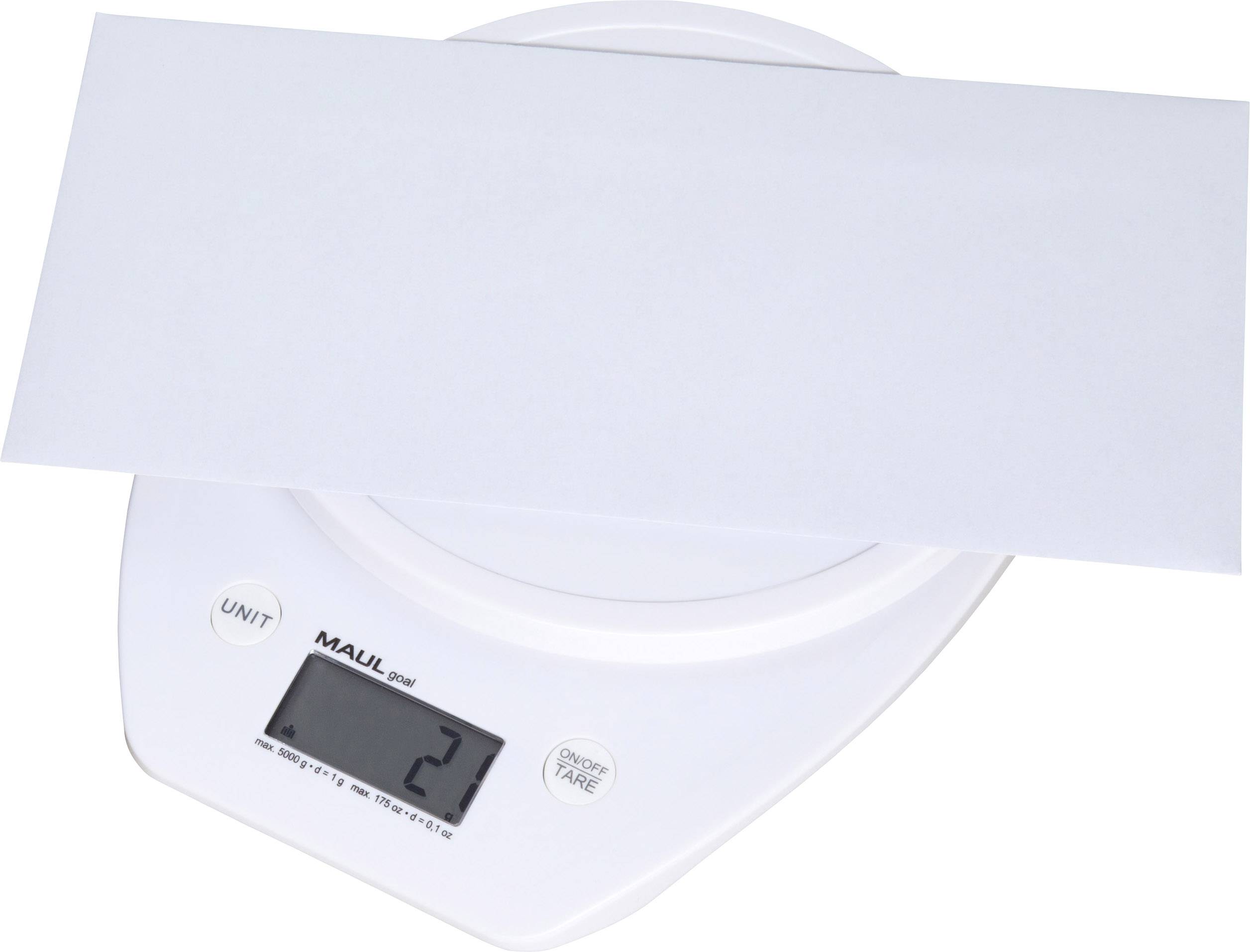 An envelope is resting on a digital scale, which displays a weight of 21 grams.