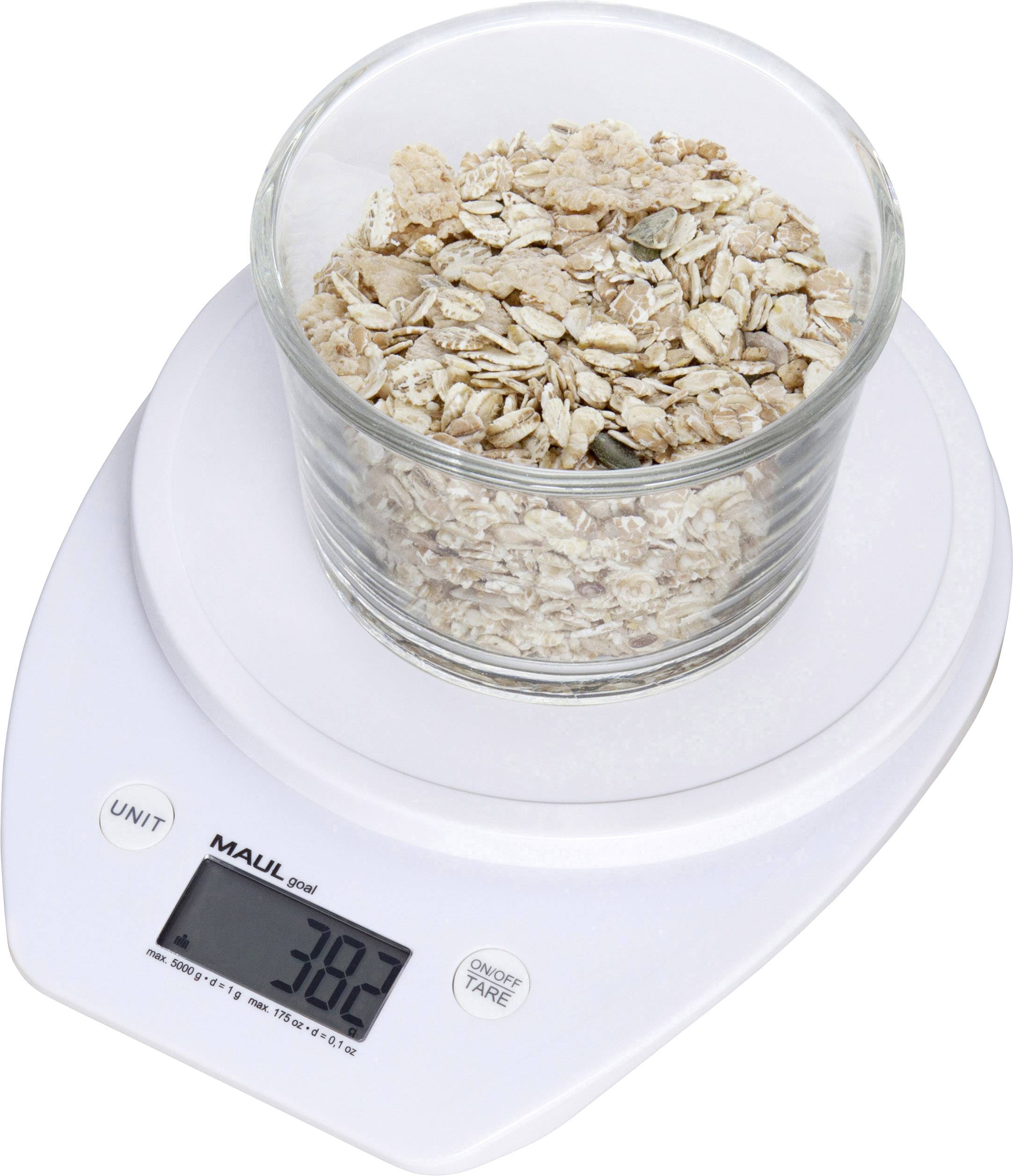 A glass of porridge oats sits on a digital kitchen scale, displaying a weight of 308 grams.