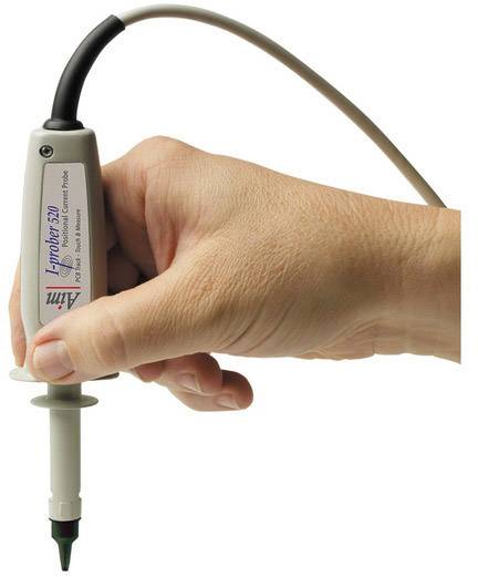 A hand is holding an electronic test probe; the device is used for current measurement.
