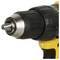 A yellow cordless drill photographed from the side. The chuck is made of metal. The tool has an ergonomic handle.