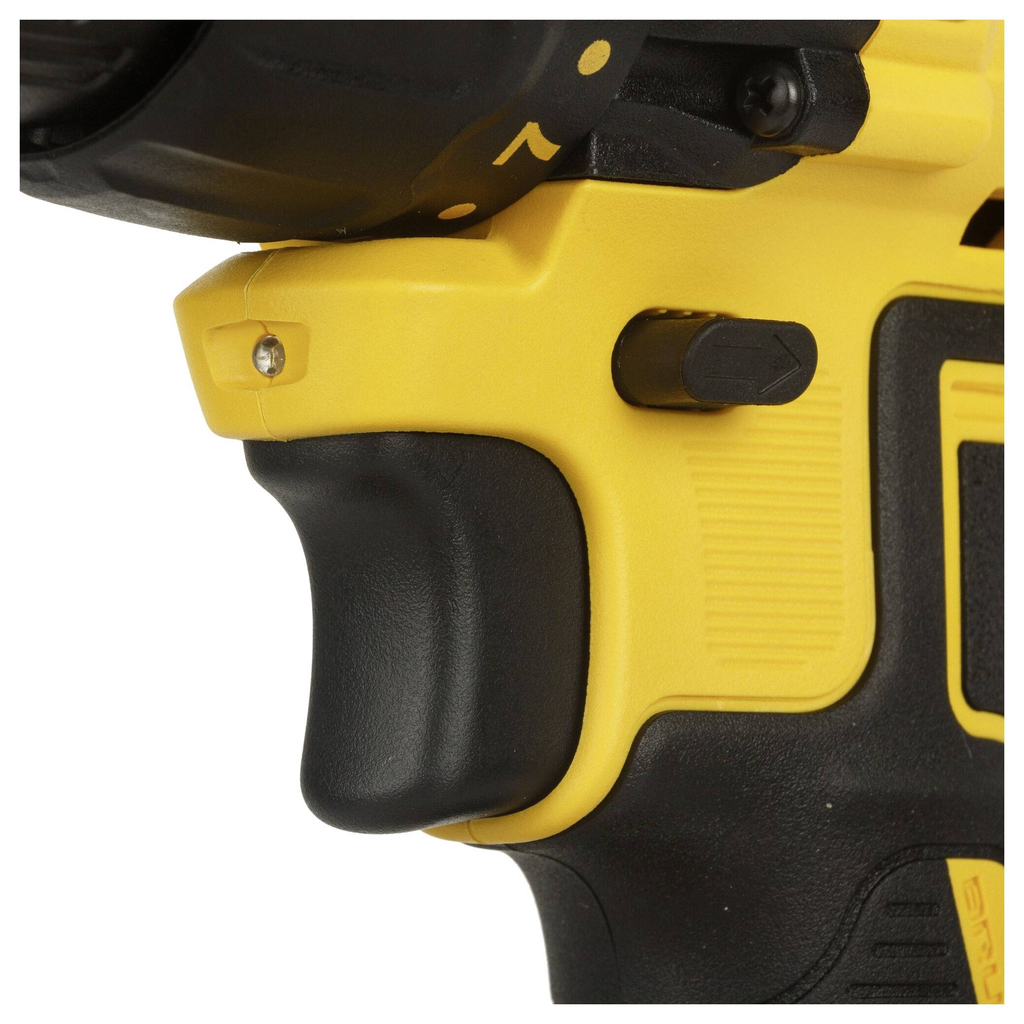 Close-up of a yellow power tool, focusing on the black handle and button.
