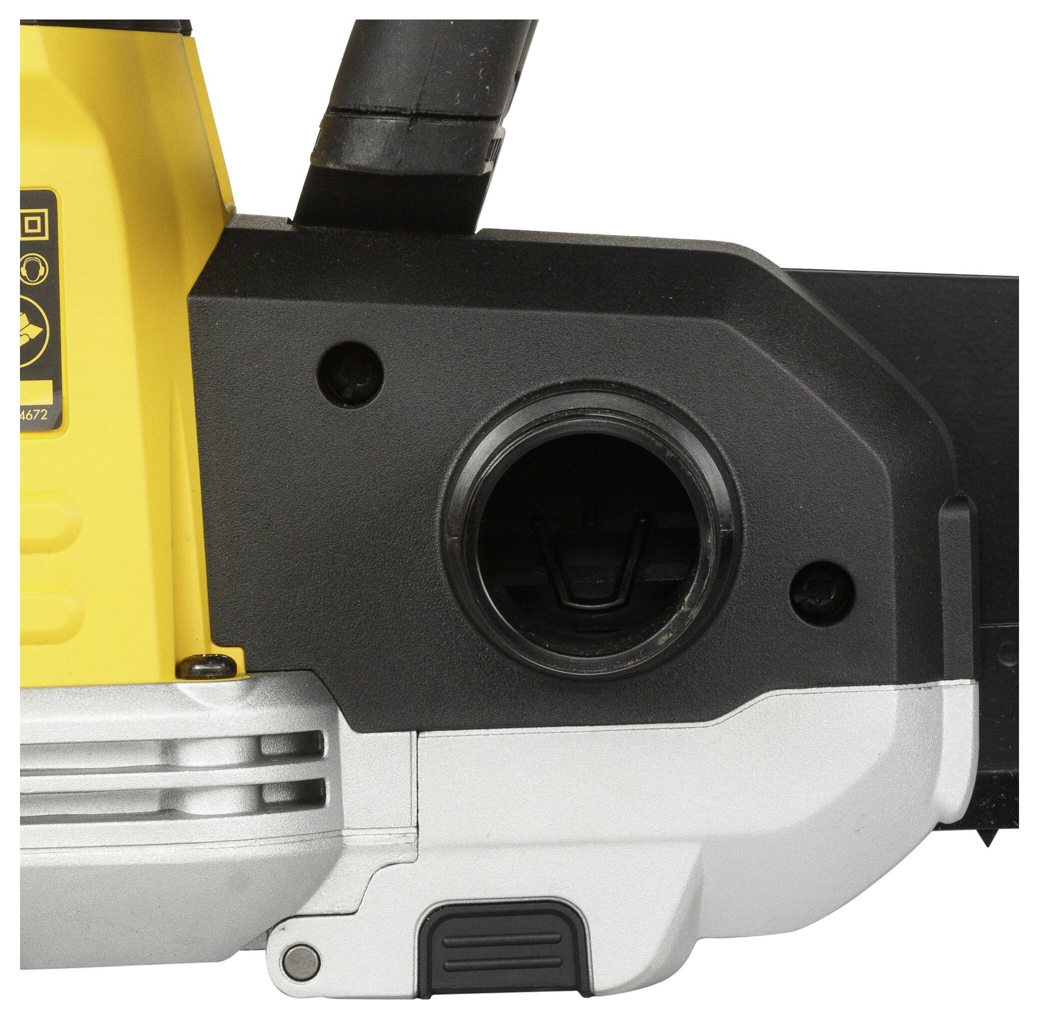 A section of a yellow chainsaw focusing on the oil filler neck and parts of the engine.