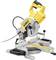 Electric mitre saw with yellow and black design, showing blade and ruler on a workbench. Ideal for precise woodworking.