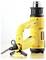 Yellow hairdryer with black handle and cable, lying on a light background.