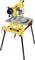 'DEWALT table circular saw on folding stand, yellow and black.'
