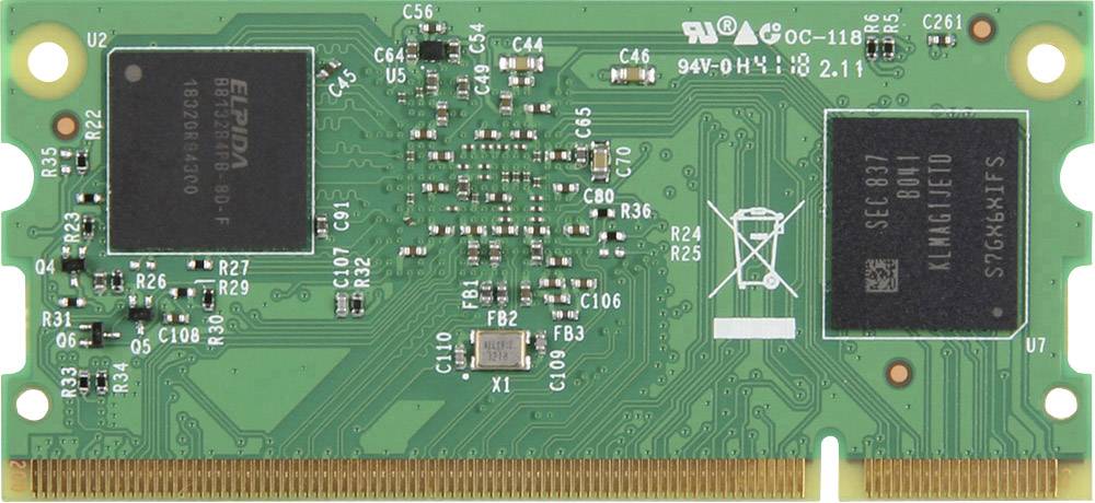 Green circuit board with chips and electronic components, showing technical details of a memory card.