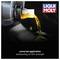 'LIQUI MOLY' bottle with a luminous yellow liquid being poured into a motor opening. Text: 'universally applicable, outstanding lubricant film stability'.