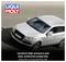 A silver car is driving on a road. The 'LIQUI MOLY' logo is positioned in the top left. Text at the bottom reads: 'excellent high-pressure and wear protection properties'.