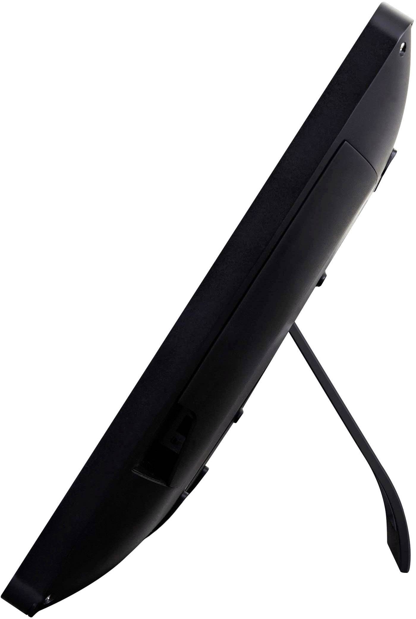 Side view of a black, digital photo frame with a stand positioned vertically.