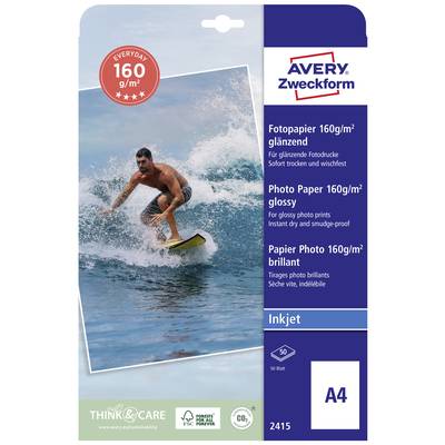 A man is surfing on a wave in the ocean. On the packaging it states 'Photo Paper 160gsm glossy' by Avery Zweckform, suitable for inkjet printers, A4 size, 50 sheets.