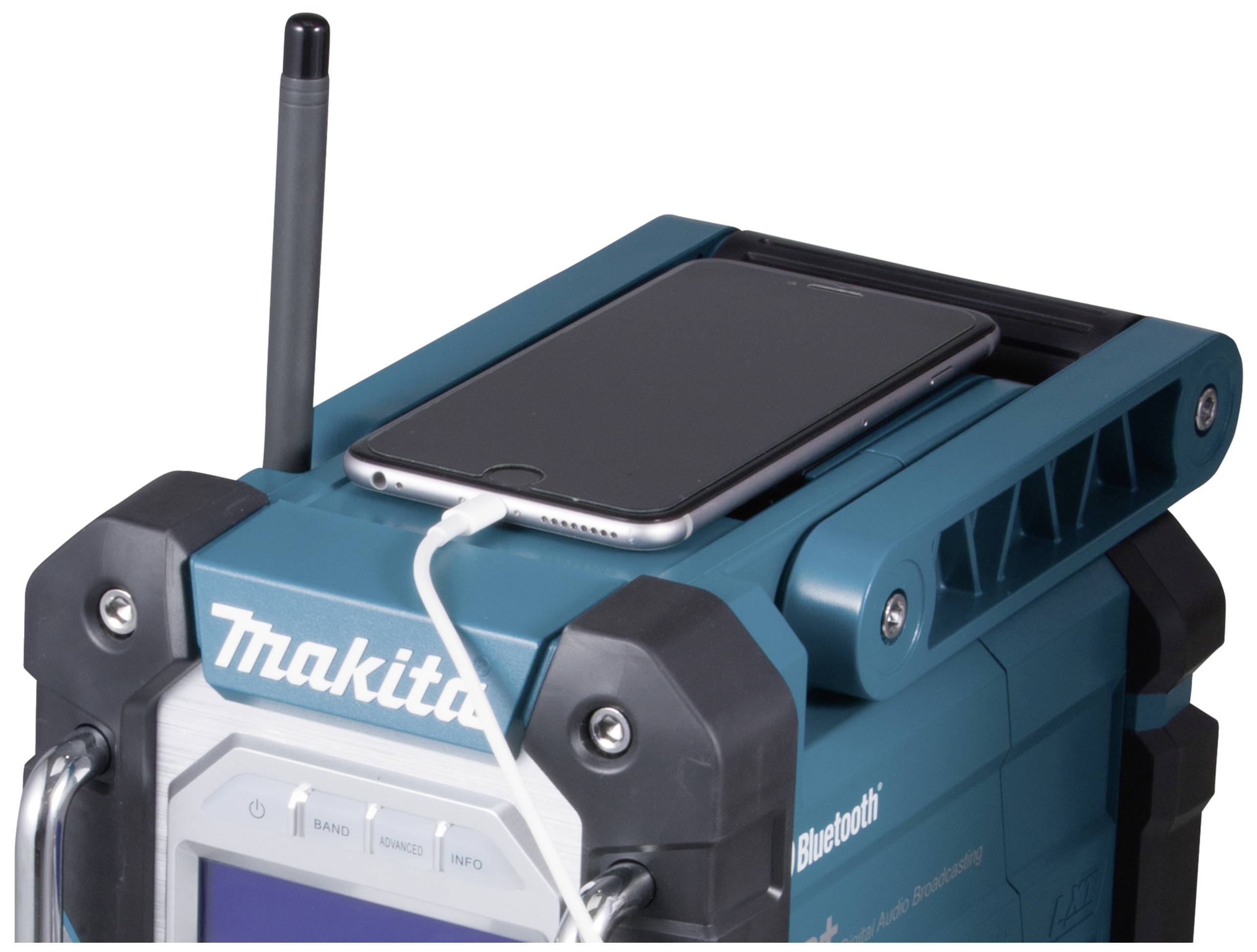 A portable construction site radio with Bluetooth functionality and a smartphone that can be charged on top.