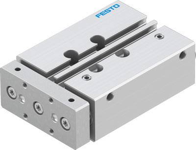 Industrial component from Festo, most likely a pneumatic sliding drive. Rectangular in shape with multiple screw holes.