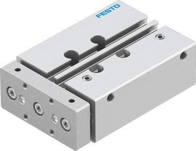 A silver, rectangular pneumatic module with a slider and multiple mounting points, bearing the brand name 'Festo'.
