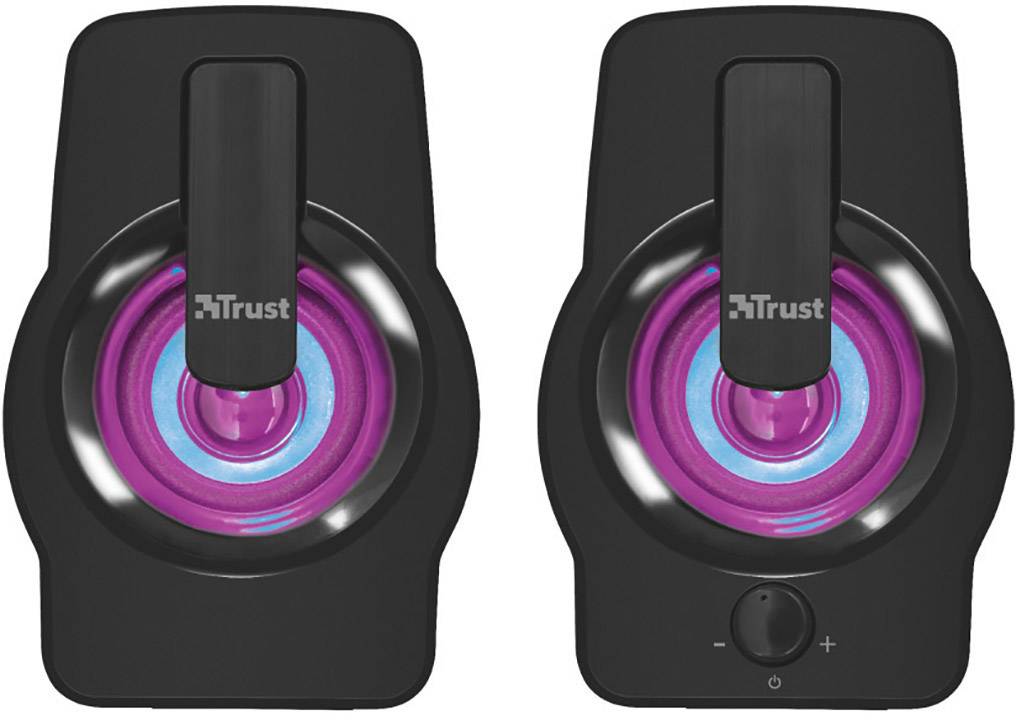 Two black speakers with blue-pink light rings and the 'Trust' logo on the front. The right speaker has a volume control dial.