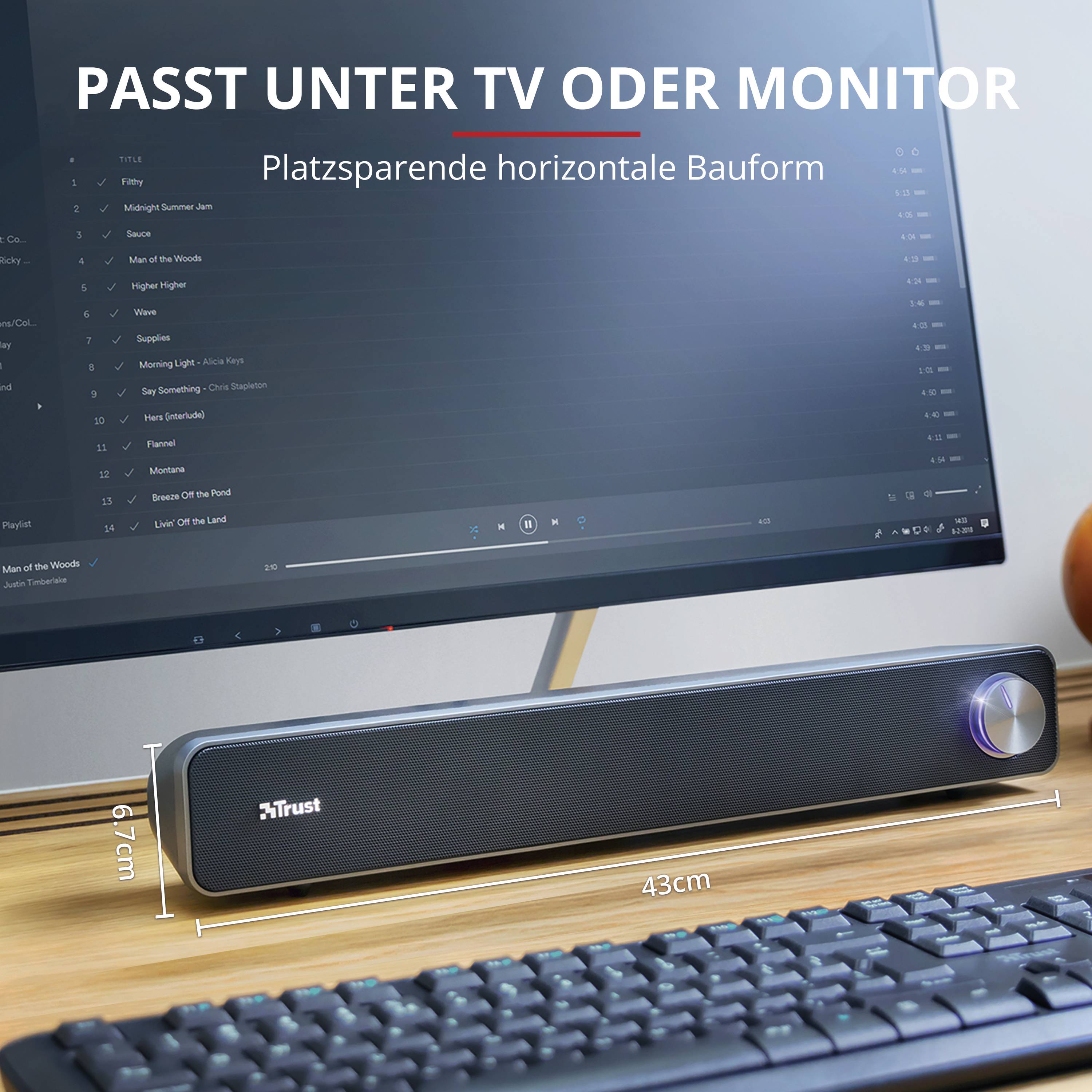 Soundbar with space-saving, horizontal design, shown beneath a monitor. It measures 43 cm in width and 7.4 cm in height.