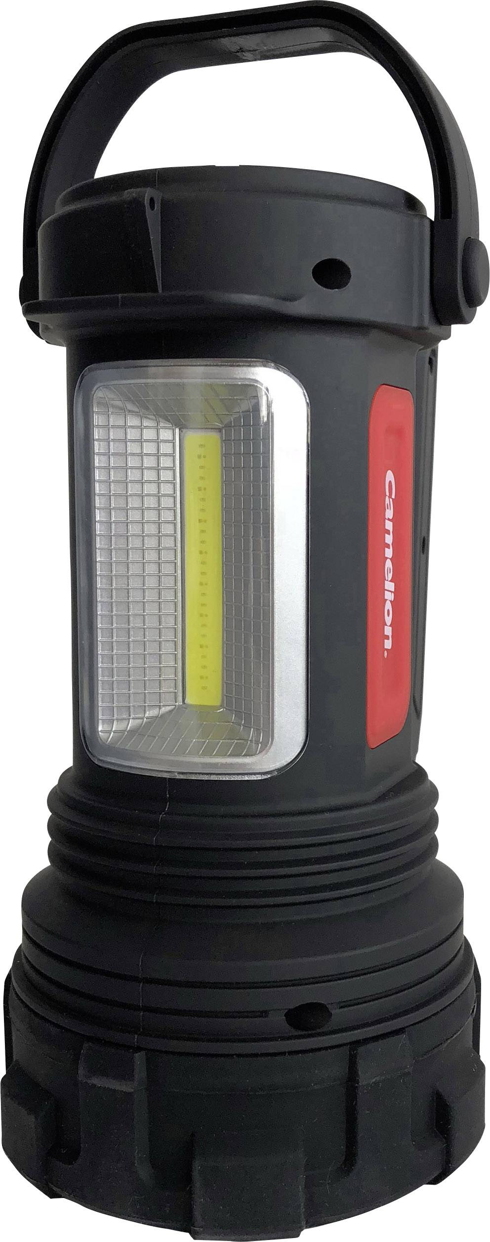 A black camping lamp with a red accent and a large rectangular light field in the centre. It has a handle on top.