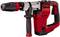 A red Einhell rotary hammer drill with an ergonomic handle and robust housing for use in heavy-duty construction work.