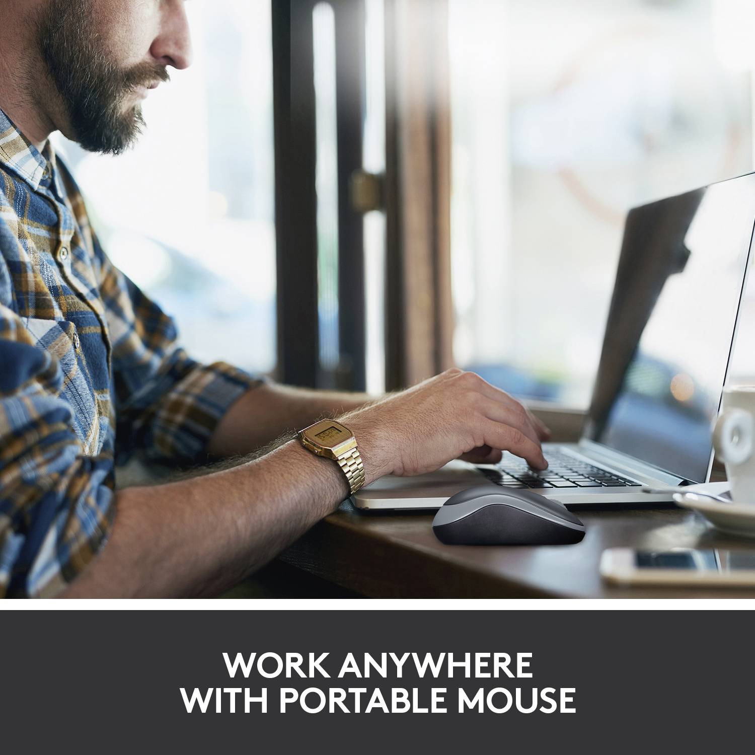 A man is working on a laptop with a wireless mouse. Underneath it reads 'Work everywhere with a mobile mouse'.