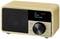 A compact wooden radio with a digital display showing 'DAB' and 'Coffee Time to Chill'. The volume control is prominently positioned.